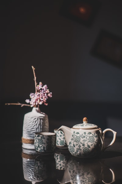 White and blue porcelain teapots
